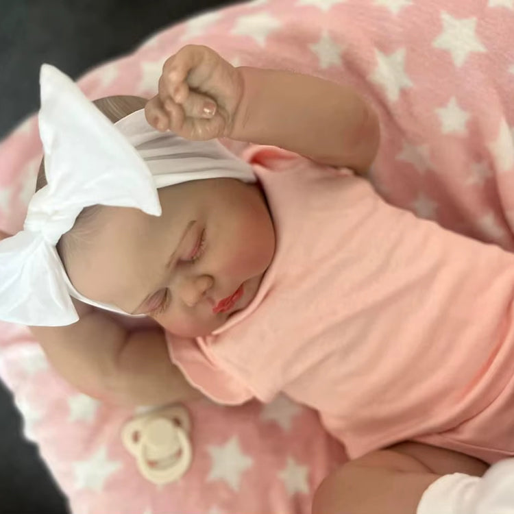Bambola Reborn Pickle da 60 cm con occhi chiusi e vestiti rosa
