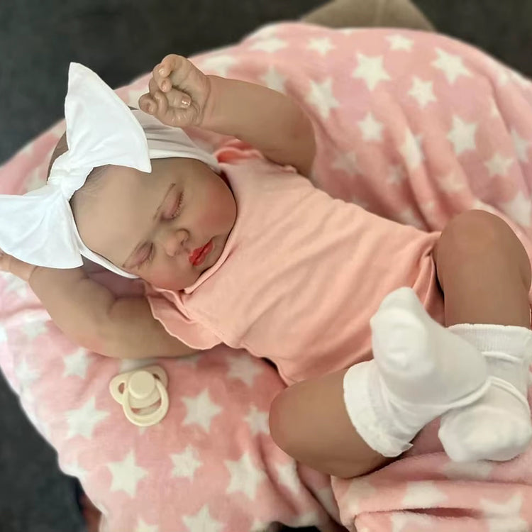 Bambola Reborn Pickle da 60 cm con occhi chiusi e vestiti rosa