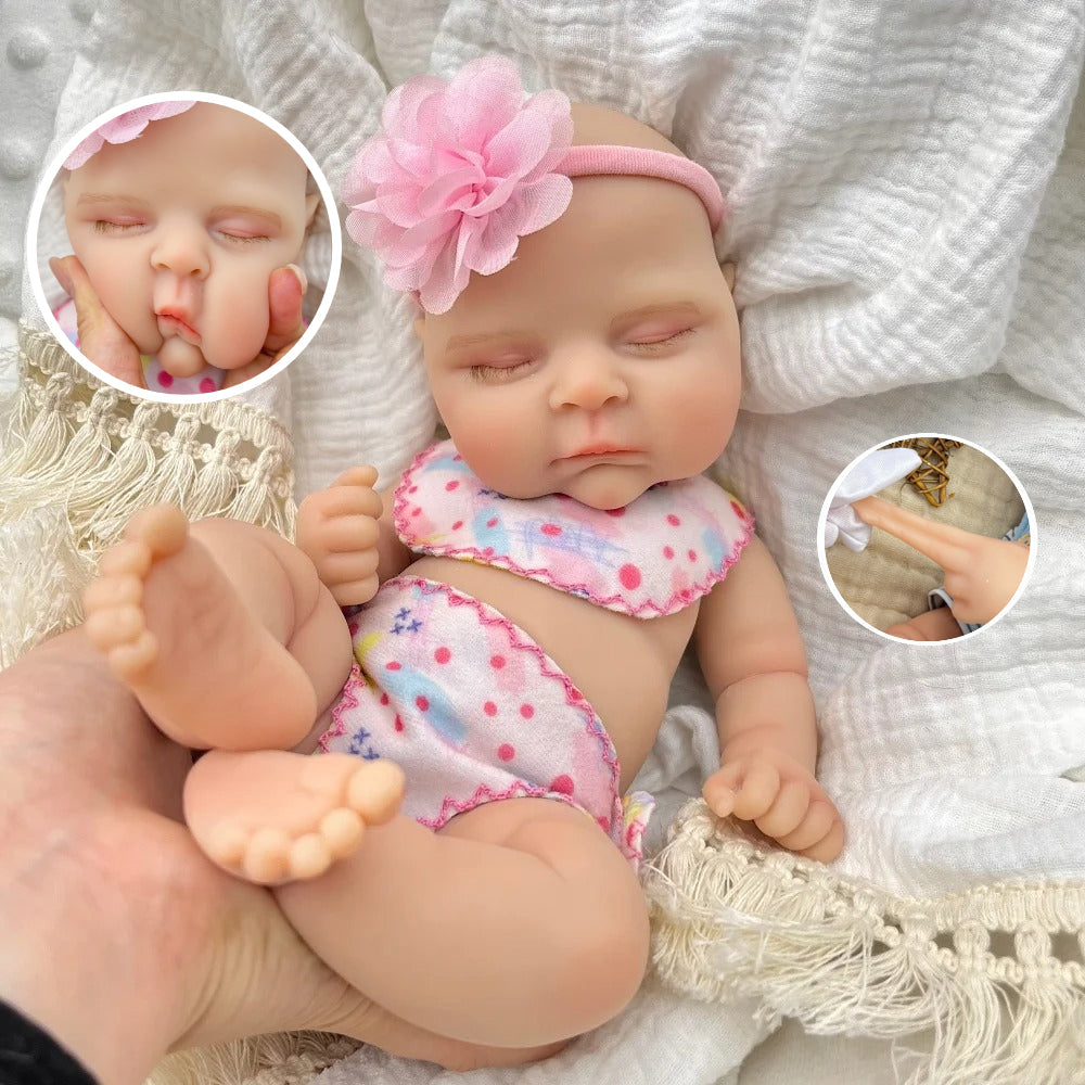 Bambola reborn femmina addormentata in silicone estensibile da 30 cm modello Peaches
