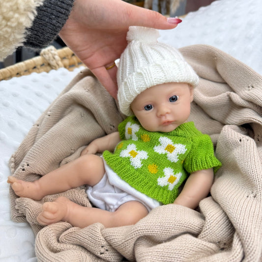 Bambina reborn in silicone da 30cm modello Meadow con maglione floreale verde