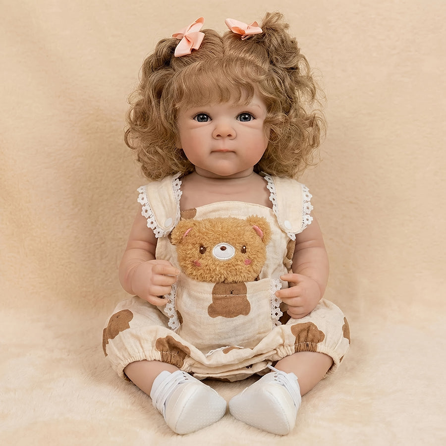 Bambola reborn Bettie alta 18 pollici con capelli biondi e occhi azzurri vestita da orsetto