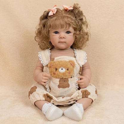 Bambola reborn Bettie alta 18 pollici con capelli biondi e occhi azzurri vestita da orsetto