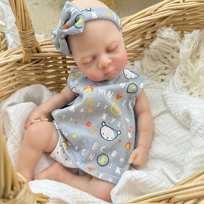 Bambina reborn in silicone realistica di 30 cm Luna con vestito grigio