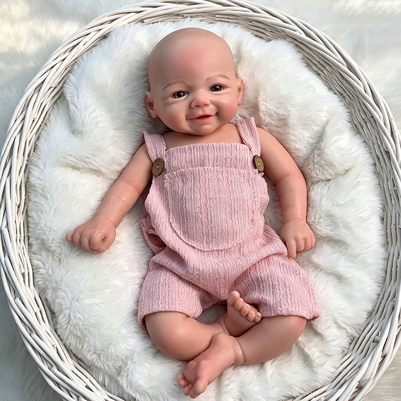 Bambola Reborn femminile Vivienne (45 cm / 18 pollici) in silicone pieno dall'aspetto realistico e con sorriso con salopette rosa
