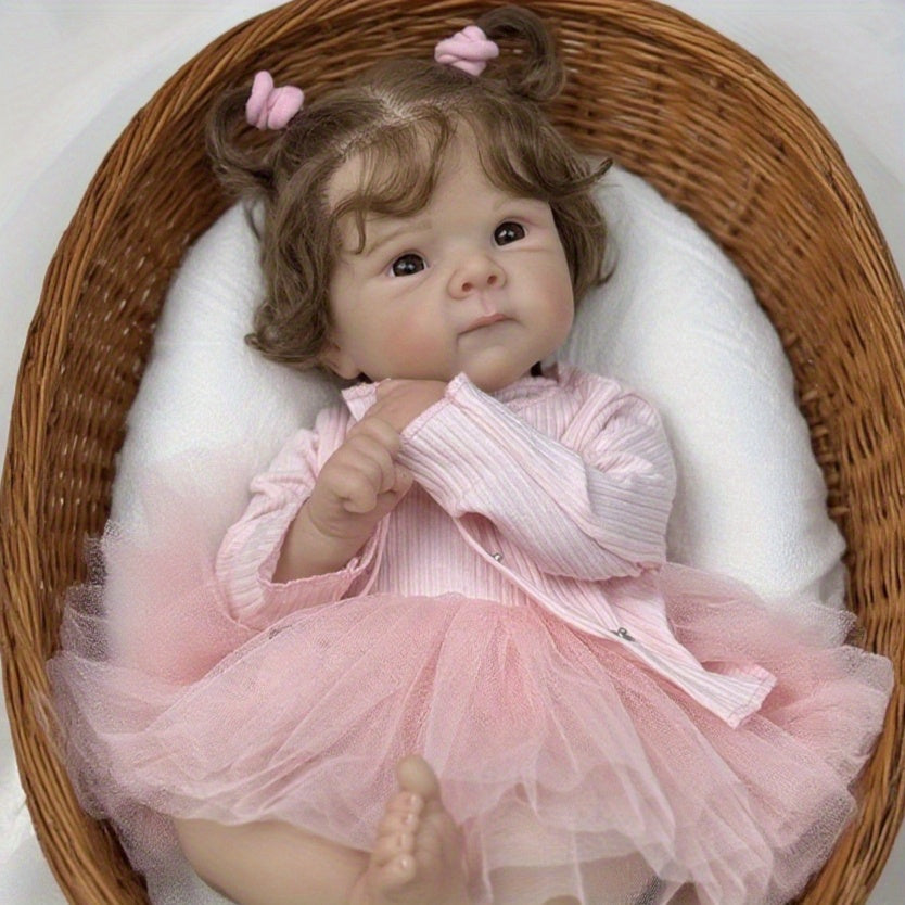 Bambola Reborn Bettie con corpo morbido e occhi aperti da 48 cm in abito rosa