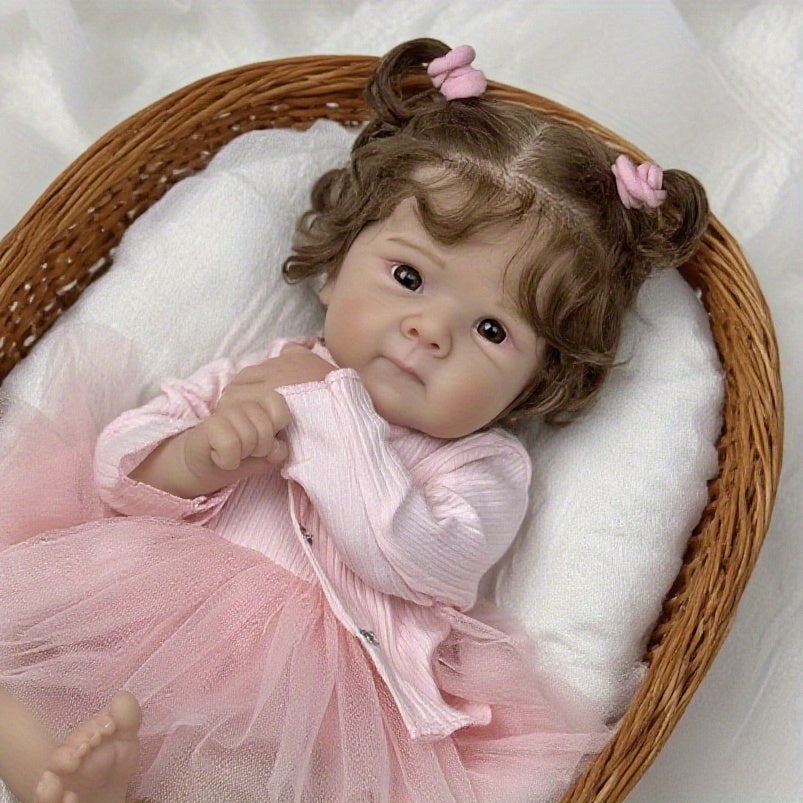 Bambola Reborn Bettie con corpo morbido e occhi aperti da 48 cm in abito rosa