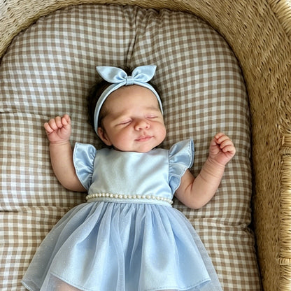 Bambina reborn Pascale addormentata 48 cm con vestito blu