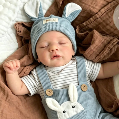 Bambola reborn Sam da 19 pollici con occhi chiusi vestita da coniglio blu