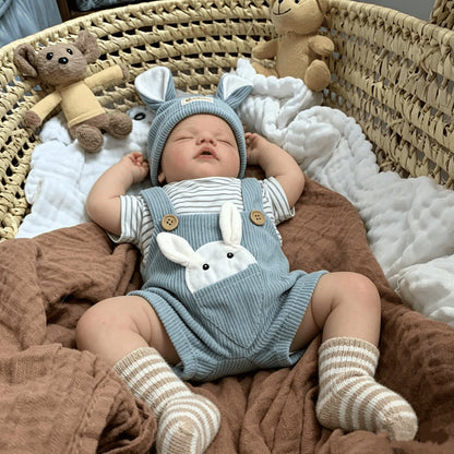 Bambola reborn Sam da 19 pollici con occhi chiusi vestita da coniglio blu