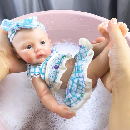 Neonata rinata in silicone da 30 cm con abito floreale blu