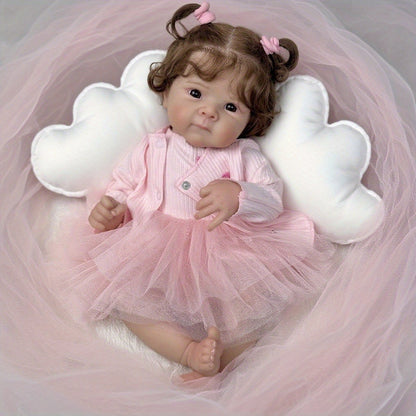Bambola Reborn Bettie con corpo morbido e occhi aperti da 48 cm in abito rosa