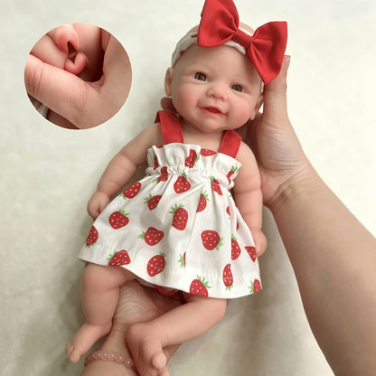 Bambola reborn Vivienne in silicone da 30 cm bambina con vestito a fragole