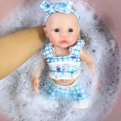 Neonata rinata in silicone da 30 cm con abito floreale blu