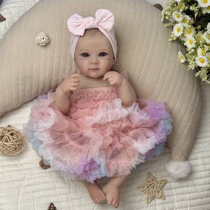Bambina rinata Bettie con occhi aperti 48 cm in abito rosa