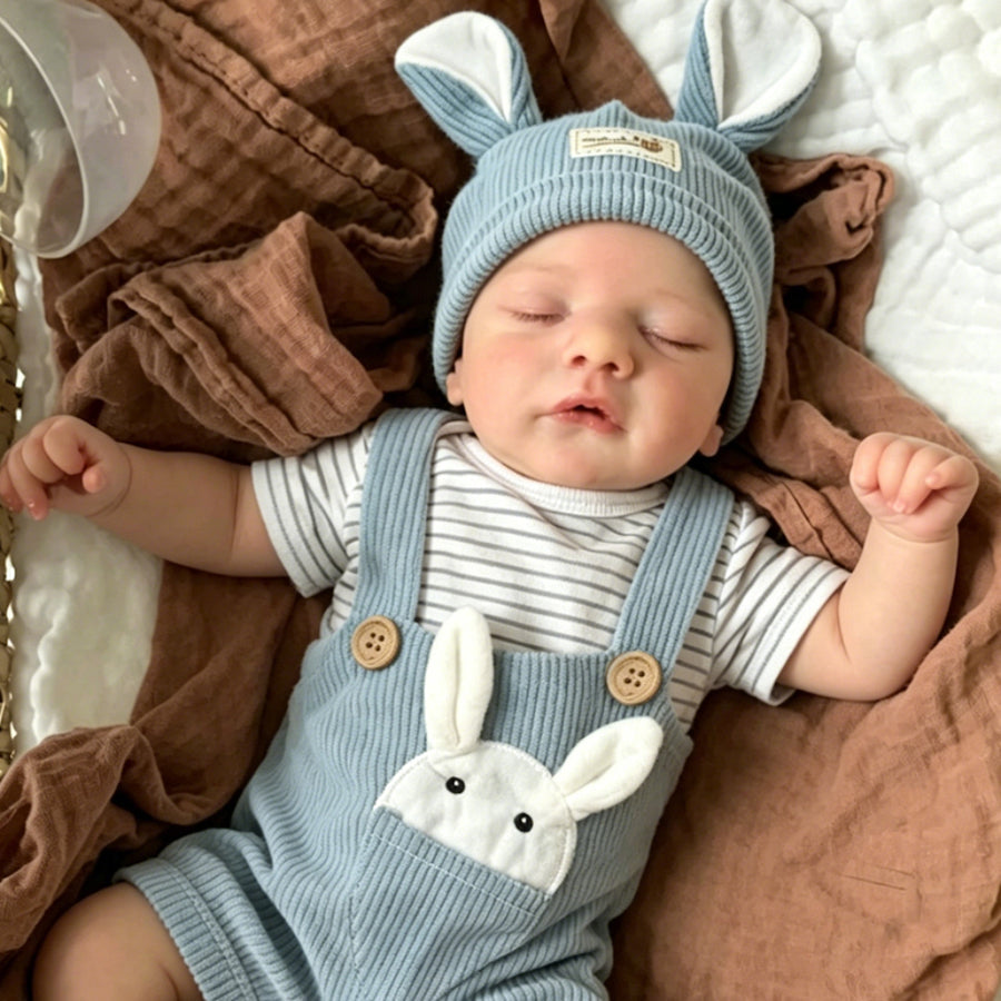 Bambola reborn Sam da 19 pollici con occhi chiusi vestita da coniglio blu
