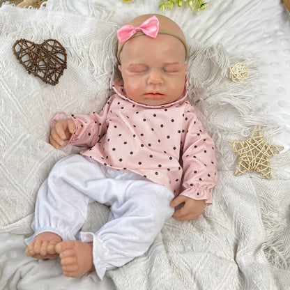 Bambina reborn Loulou addormentata in silicone estensibile alta 45 cm con vestitino a pois rosa