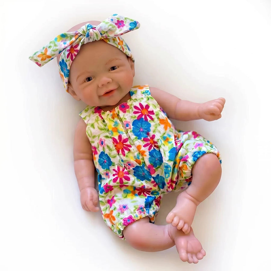 Mini bambola Reborn Vivienne da 20 cm in silicone pieno con tutina a fiori
