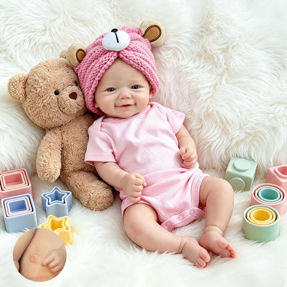 Bambola reborn Vivienne in silicone realistica da 45cm con tutina rosa