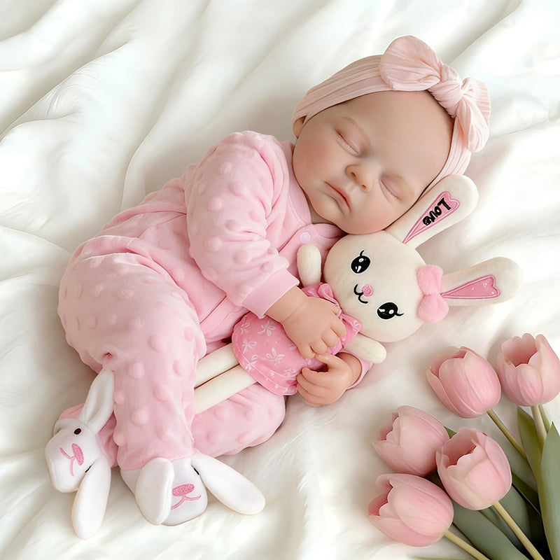 Bambola reborn Peaches in silicone realistica alta 45cm con abito rosa