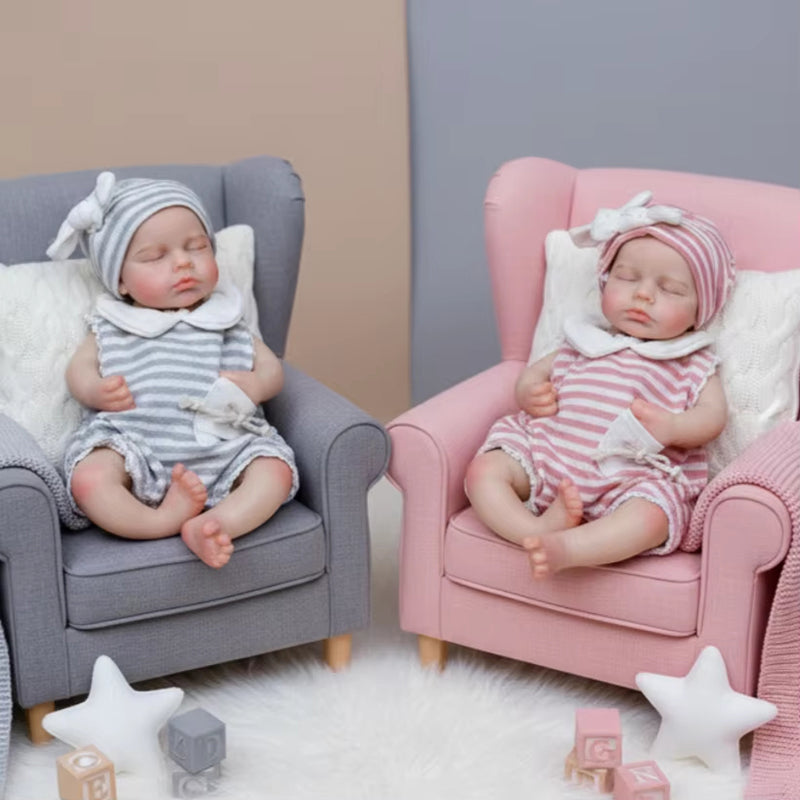 Gemelle Reborn Loulou da 30 cm in silicone realistiche a occhi chiusi con vestitini a righe