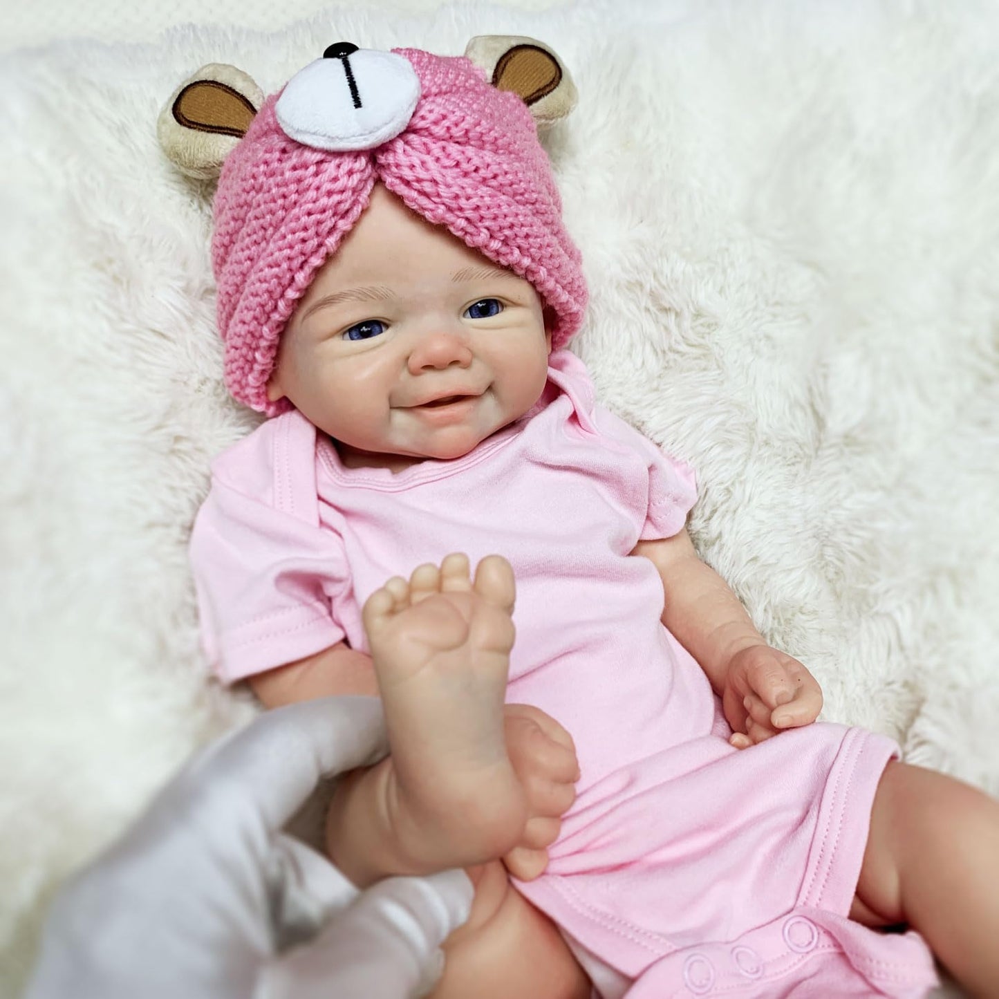 Bambola reborn Vivienne in silicone realistica da 45cm con tutina rosa