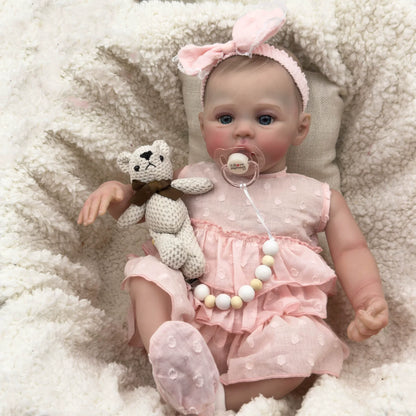 Reborn Baby Meadow 48 cm occhi azzurri corpo morbido in abito rosa