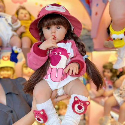 Bambina rinata con capelli lunghi 55 cm/60 cm in abiti rosa da orso