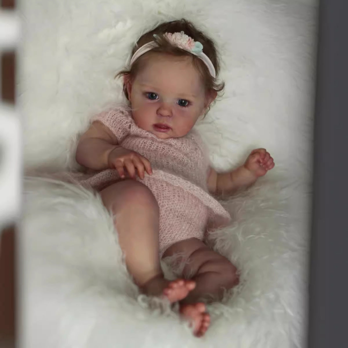 20 inch reborn doll with blue eyes and short hair