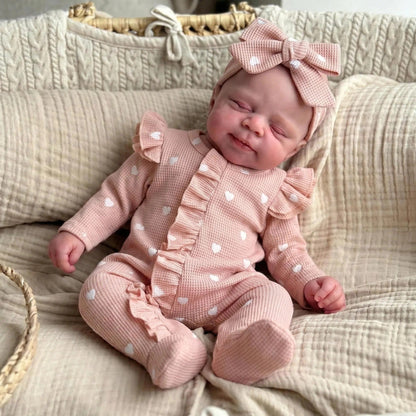 Bambola reborn Pascale alta 45 cm completamente in silicone elasticizzato con tutina rosa a cuoricini