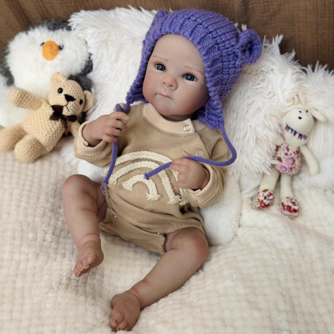 Bambina Reborn Kelly Occhi azzurri da 50 cm con cappello viola - Bettie