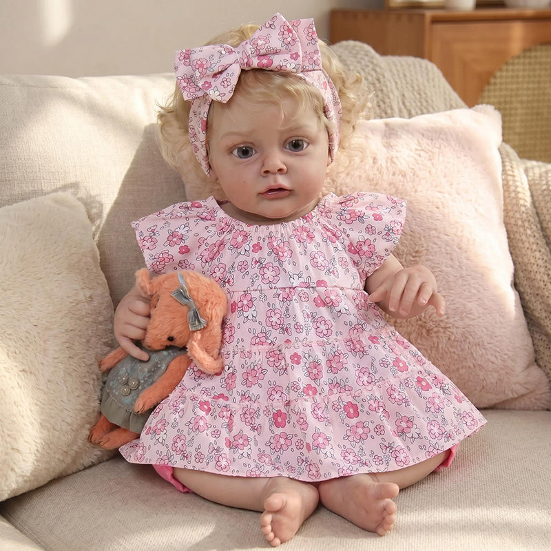 Bambola reborn Chloe da 19 pollici con capelli biondi e vestito floreale