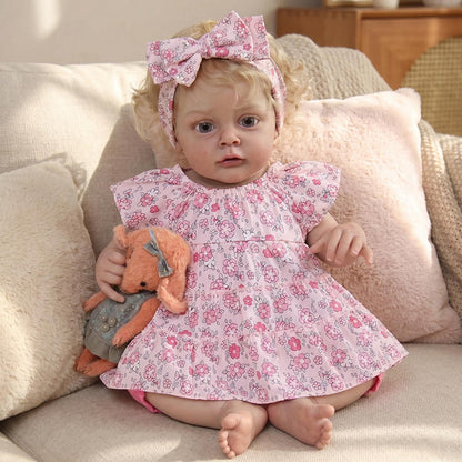 Bambola reborn Chloe da 19 pollici con capelli biondi e vestito floreale