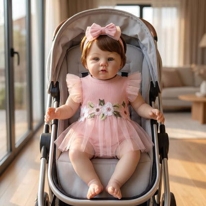 Bambola reborn Abigail da 19 pollici con capelli corti e vestito rosa