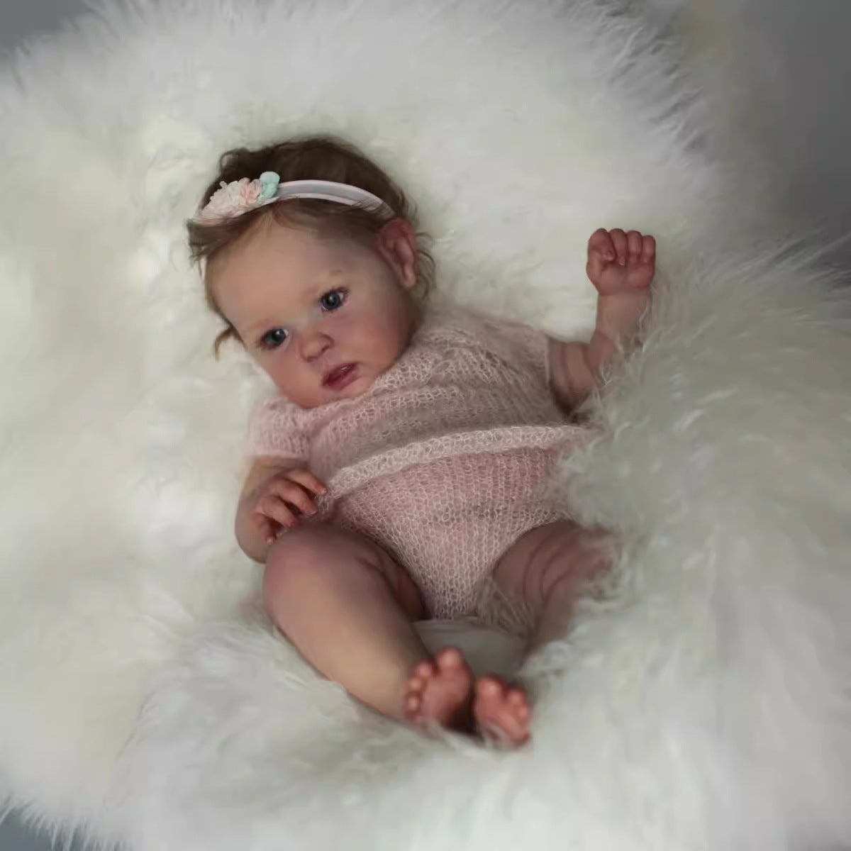 20 inch reborn doll with blue eyes and short hair