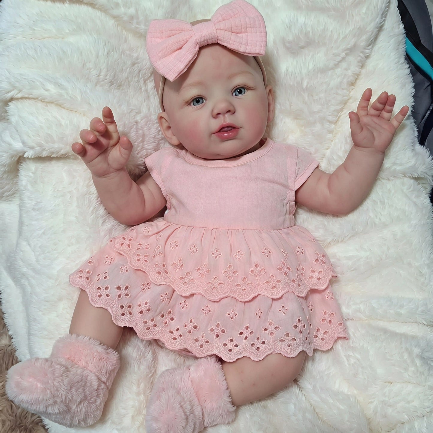 Bambola reborn Abigail da 19 pollici con vestito rosa