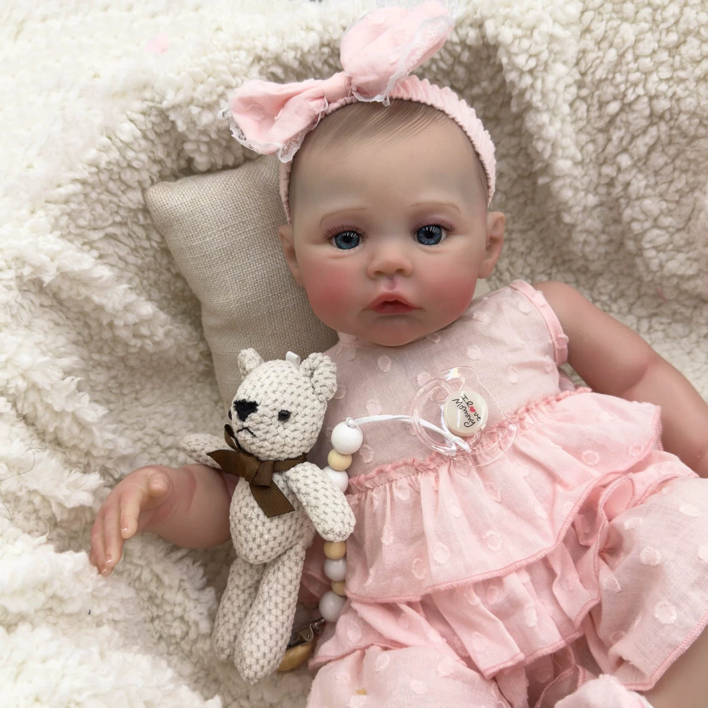 Reborn Baby Meadow 48 cm occhi azzurri corpo morbido in abito rosa