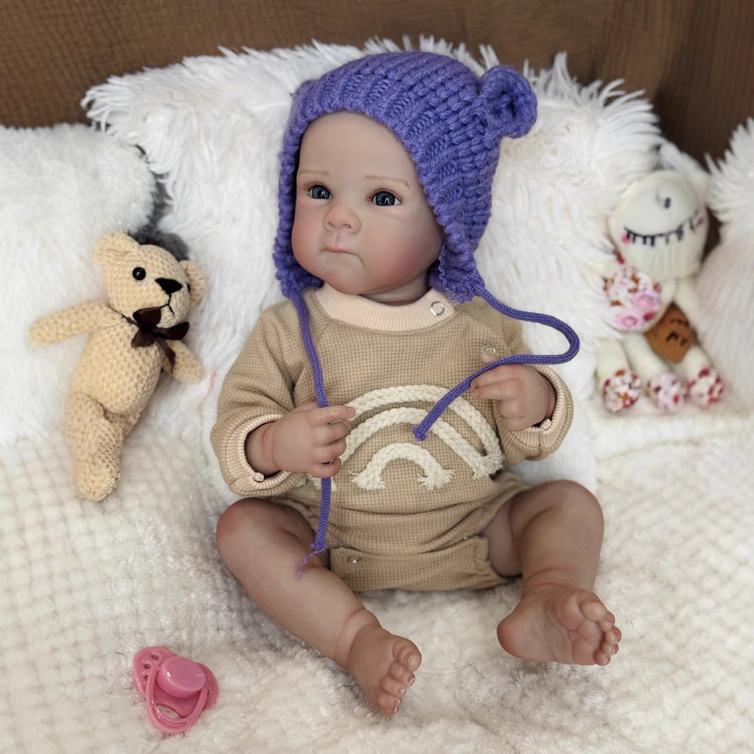 Bambina Reborn Kelly Occhi azzurri da 50 cm con cappello viola - Bettie