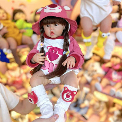 Bambina rinata con capelli lunghi 55 cm/60 cm in abiti rosa da orso