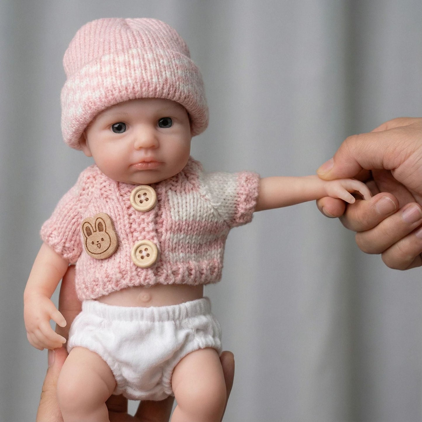 Loulou Bambina rinata in silicone da 20 cm con occhi aperti e maglione rosa