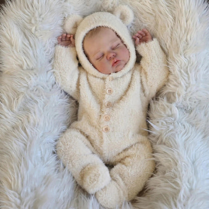 Bambola reborn di Pickle 48 cm con corpo morbido vestita con tutina di peluche beige
