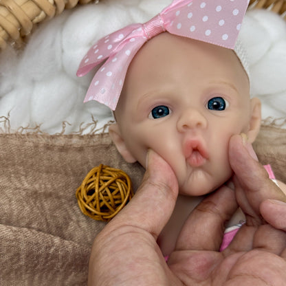 Neonata rinata in silicone da 30 cm con abito rosa