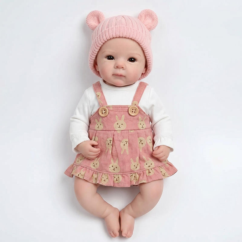 Bambola reborn Bettie in silicone da 30 cm con vestito rosa