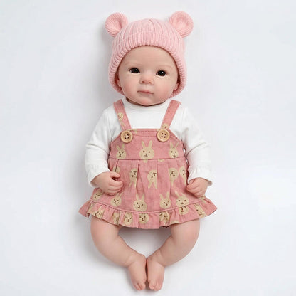 Bambola reborn Bettie in silicone da 30 cm con vestito rosa