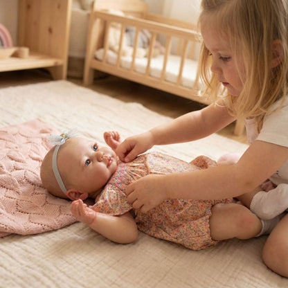 Bambola reborn Lali da 19 pollici con occhi aperti e abiti floreali