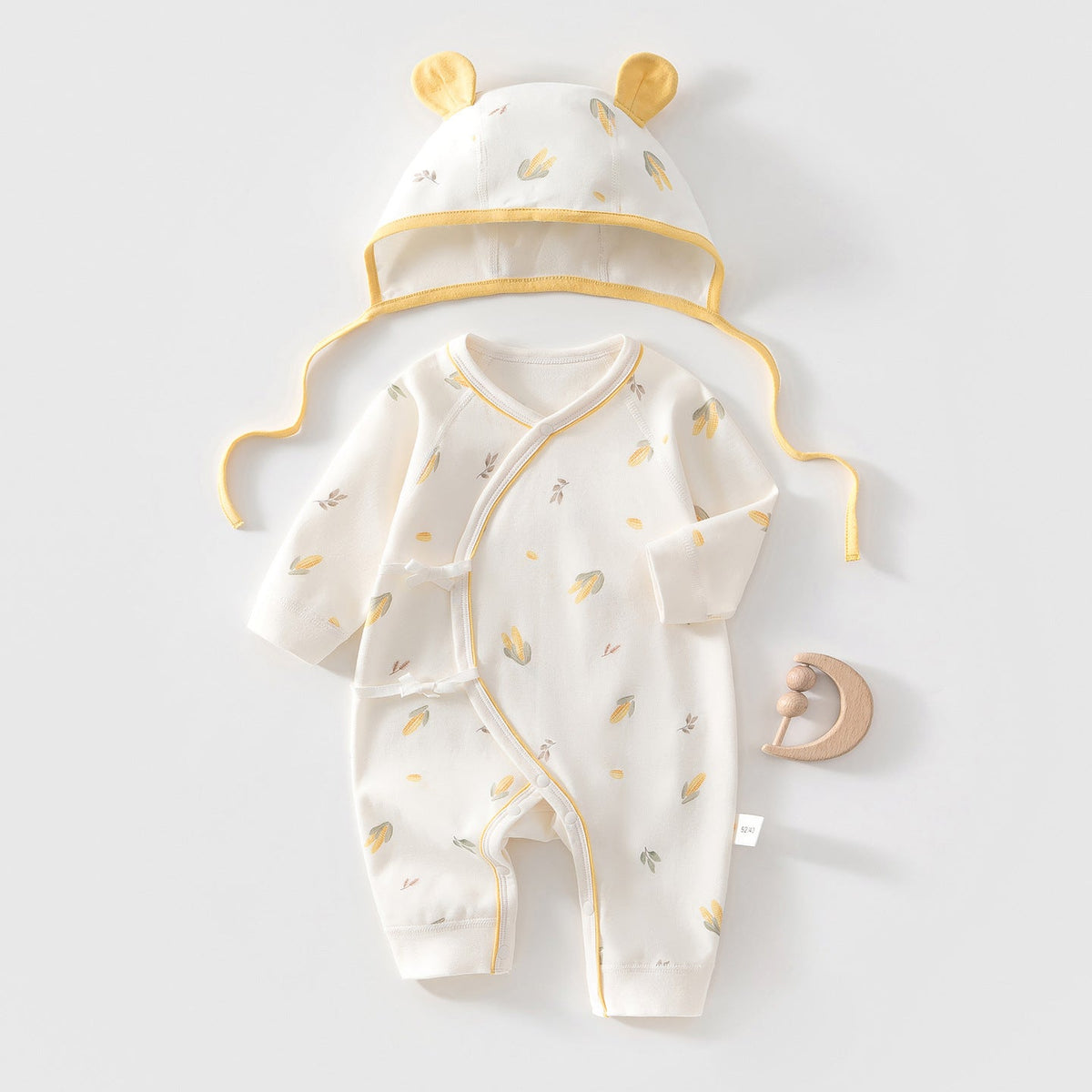 Completo due pezzi composto da body e cappellino in cotone stampato per bambole reborn da 45 a 55 cm