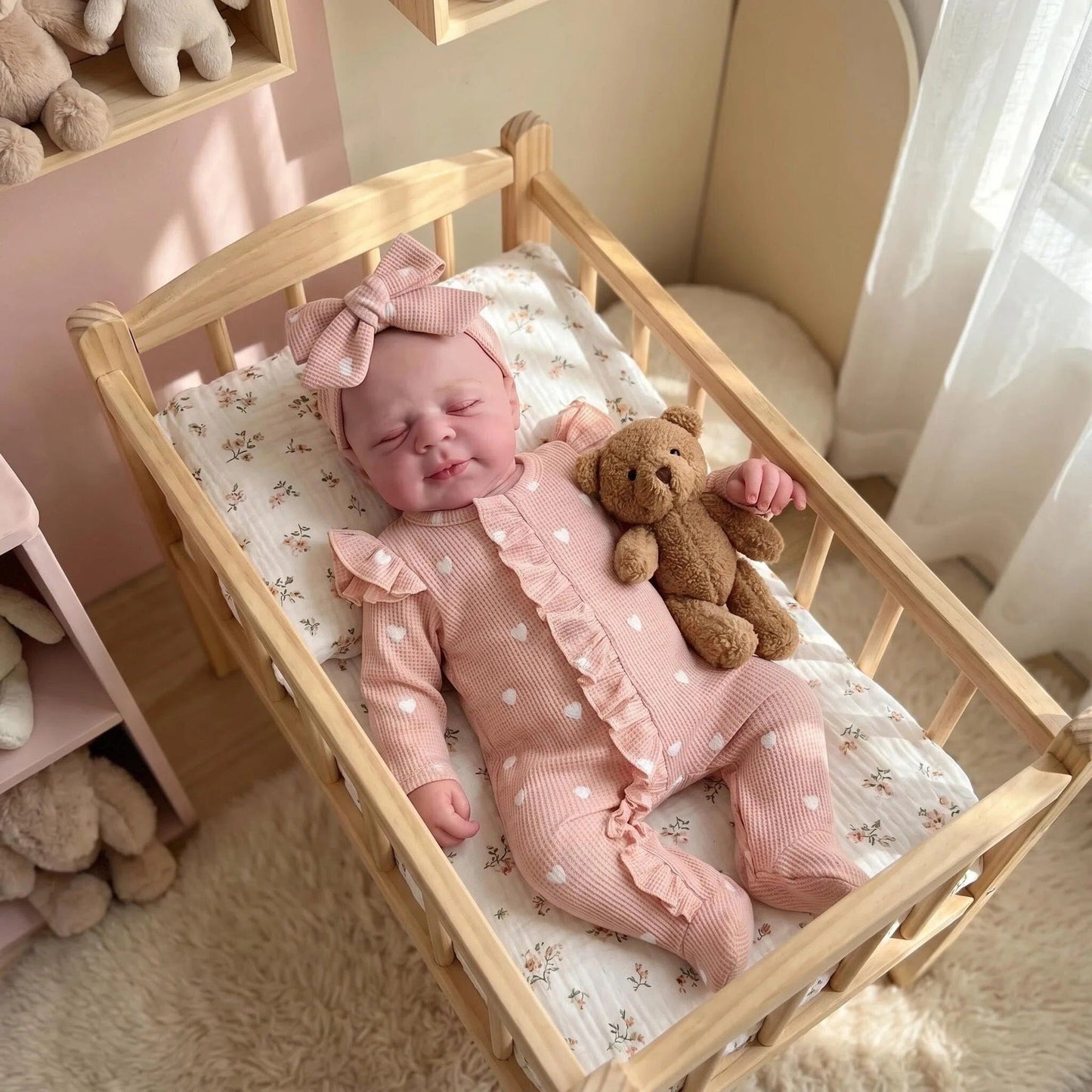 Bambola reborn Pascale alta 45 cm completamente in silicone elasticizzato con tutina rosa a cuoricini