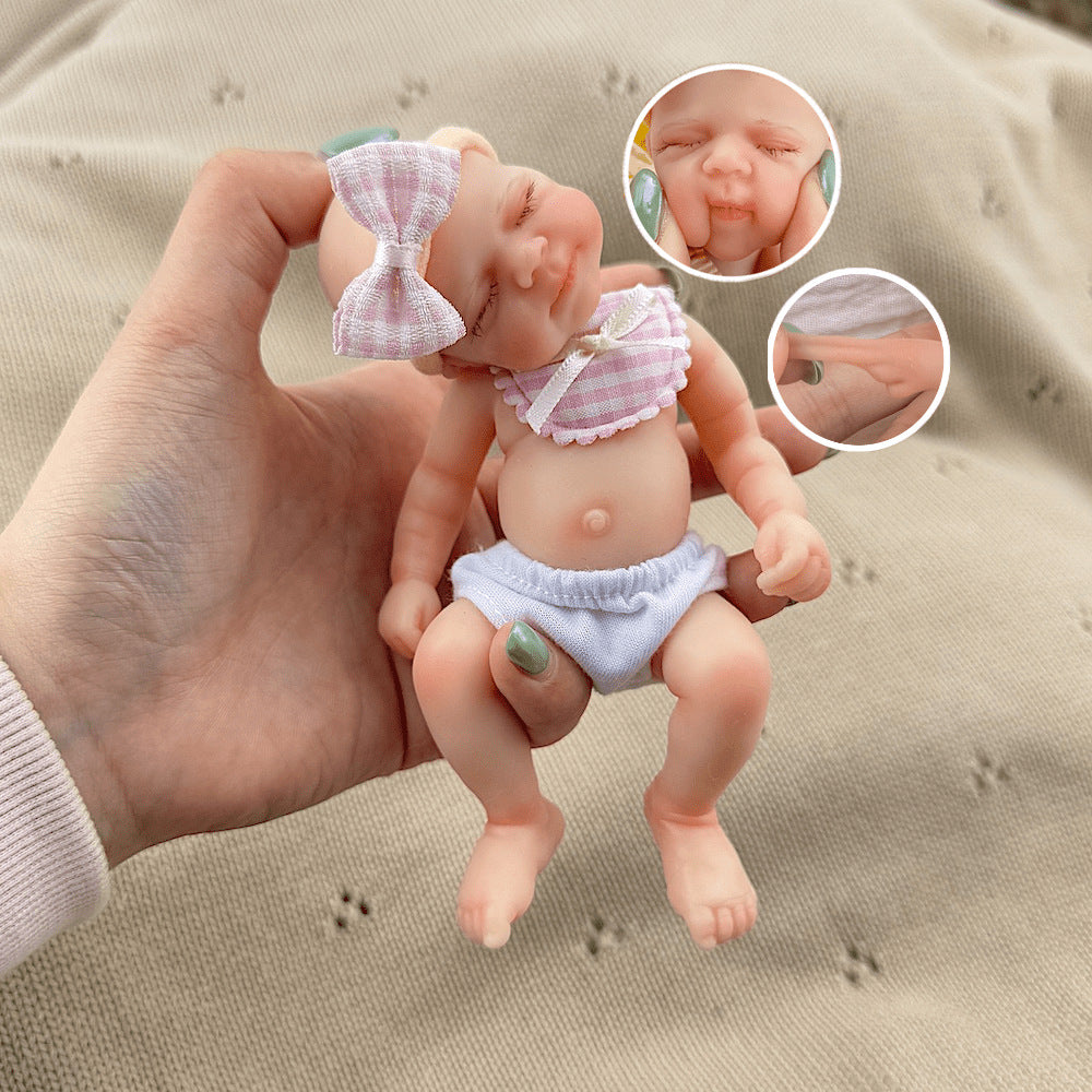 15cm Silicone Closed Eyes Pascale Mini Reborn Doll in Pink Plaid Bib
