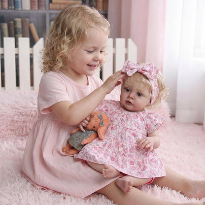Bambola reborn Chloe da 19 pollici con capelli biondi e vestito floreale
