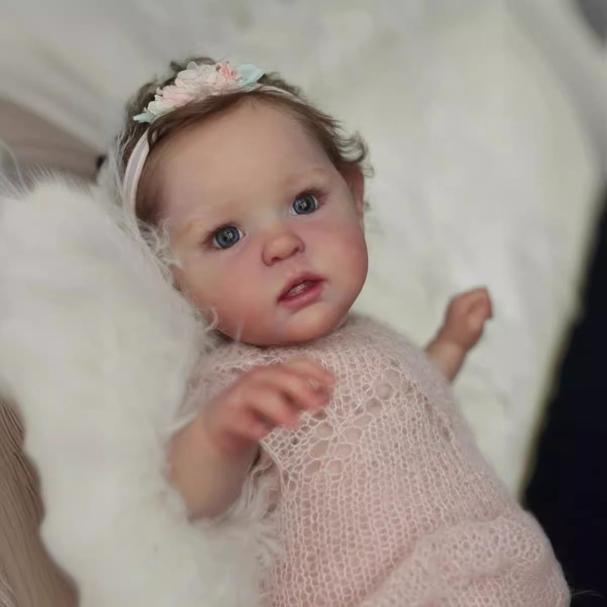 20 inch reborn doll with blue eyes and short hair