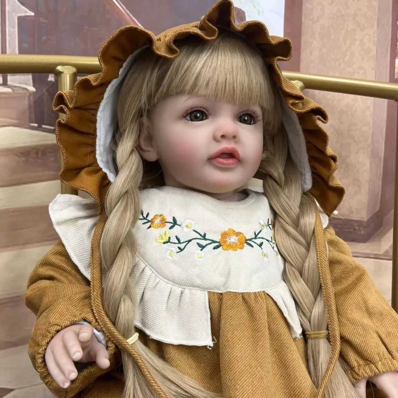 Bambola reborn Betty con lunghi capelli biondi 60cm di lunghezza e corpo in morbido cotone